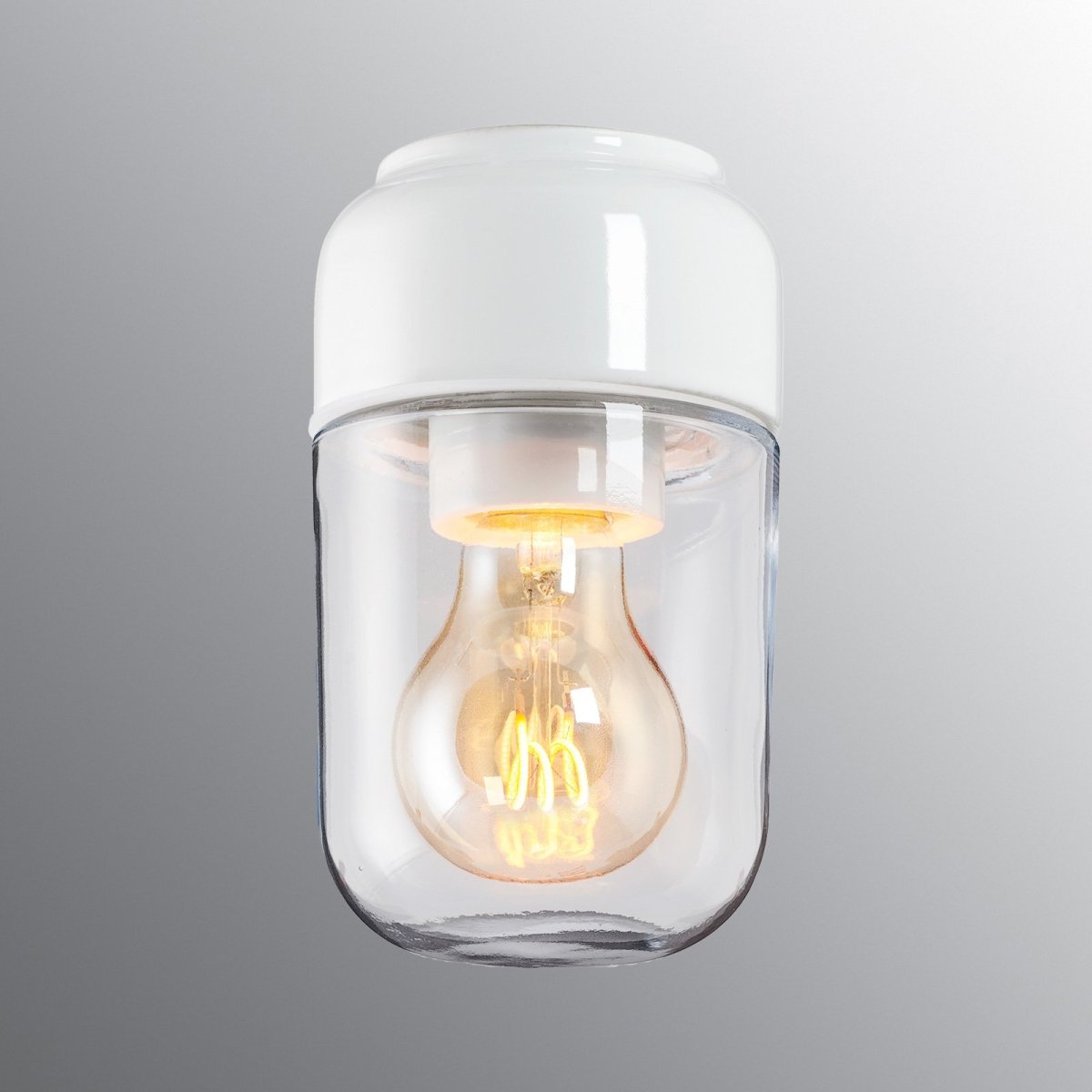 Ohm 100/170 valaisin. Valkoinen suora IP44 posliinikanta, E27 lampunpidikkeella. Kirkas lasikupu 84,5mm kierteellä. - Image 2