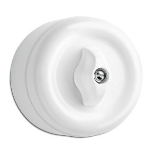Kruunukytkin (5), väännettävä. Pinta-asennus, halk. 62mm, korkeus 49mm, IP20. Valkoinen bakeliitti.