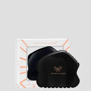 Gua sha kasvohierontalevy, joka on valmistettu obsidiaanikivestä, jolla on suuri voima Crystallove